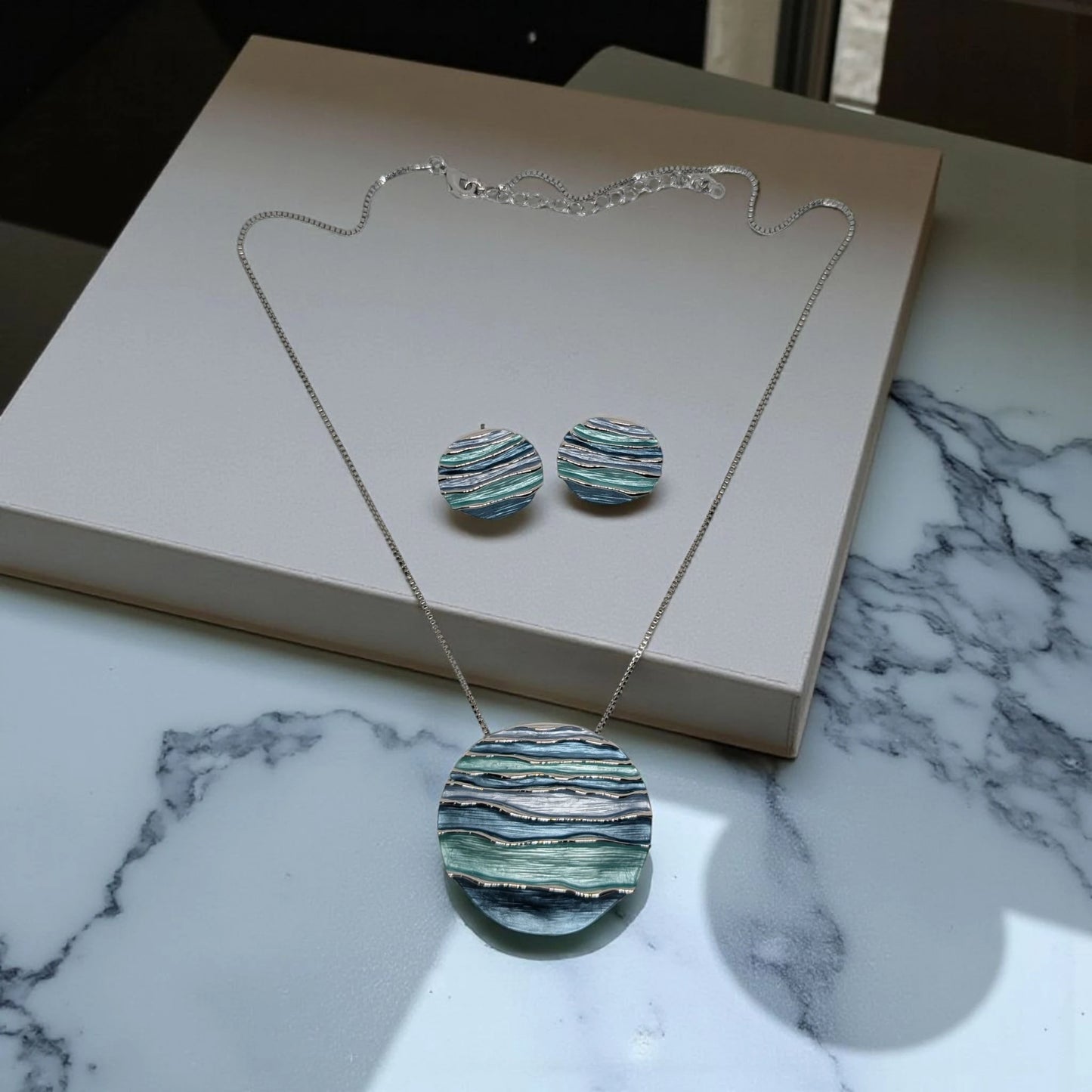 Silver Round Shape Blue Pendant Set with Earrings