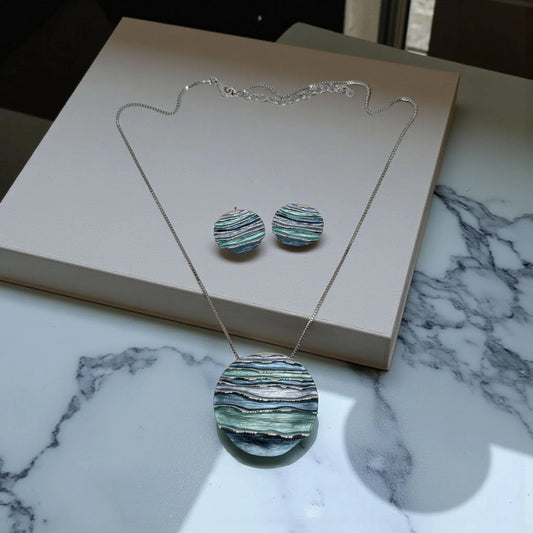 Silver Round Shape Blue Pendant Set with Earrings
