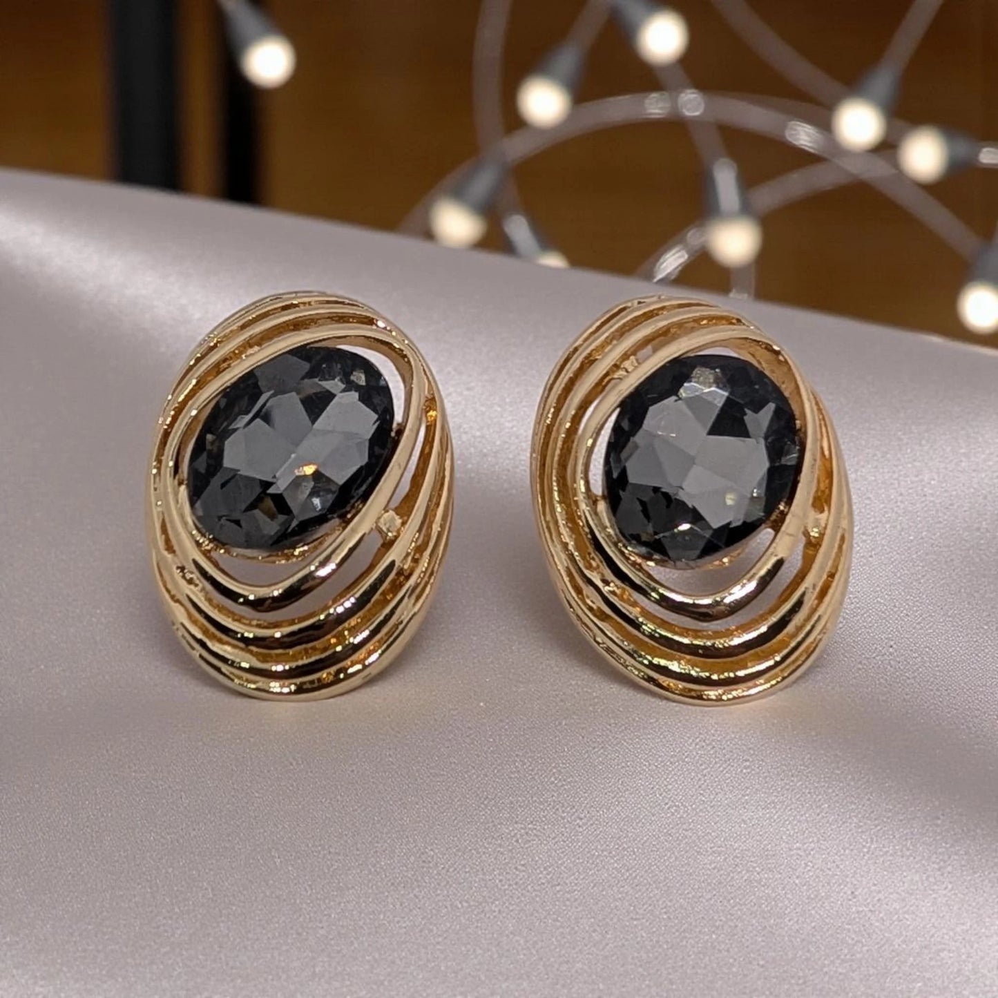 Large Gold-Toned Stud Earring.