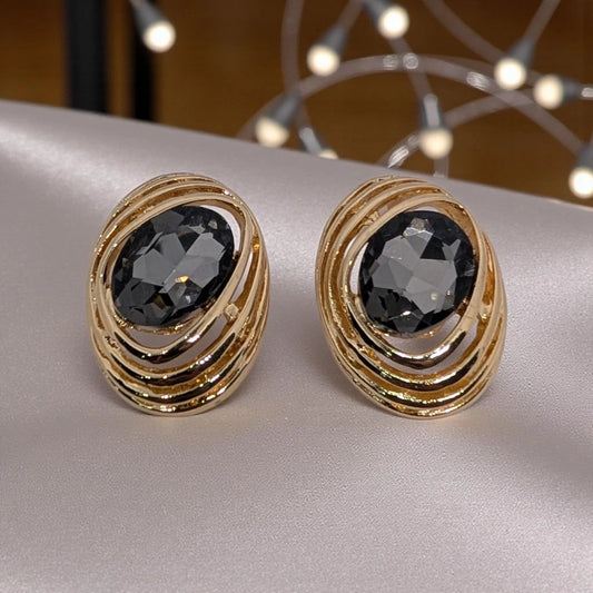 Large Gold-Toned Stud Earring.