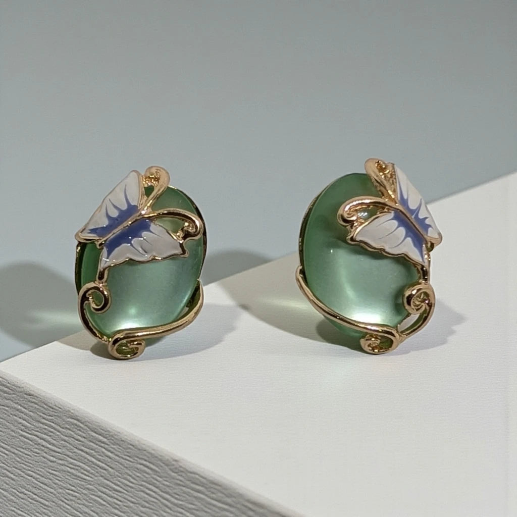 Pale Green Cabochon and Butterfly Stud Earrings